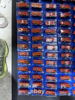 Huge Lot x64 1991 Hot Wheels ORANGE RECYCLING TRUCK Blue Card #143 all Blackwall